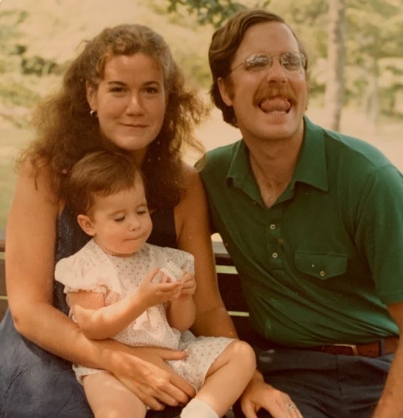 Catherine Merritt as a child with her parents